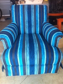 Re-upholstered arm chair